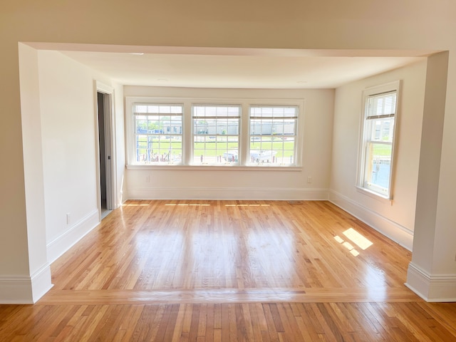 spare room with light hardwood / wood-style floors