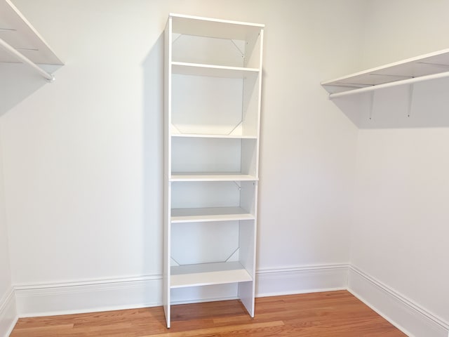 488 Parkview Dr, Detroit, MI 48214 - walk in closet with wood finished floors