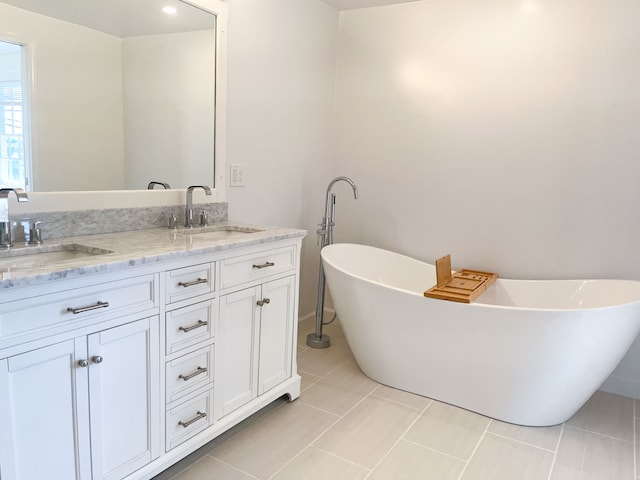 488 Parkview Dr, Detroit, MI 48214 - bathroom featuring double vanity, a soaking tub, and tile patterned flooring