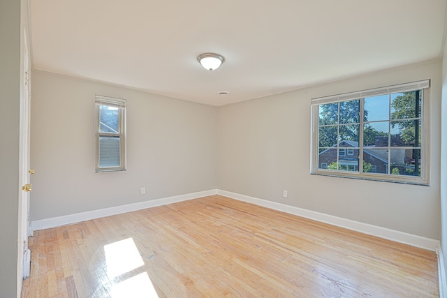 unfurnished room featuring light hardwood / wood-style flooring