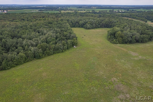 birds eye view of property featuring a rural view