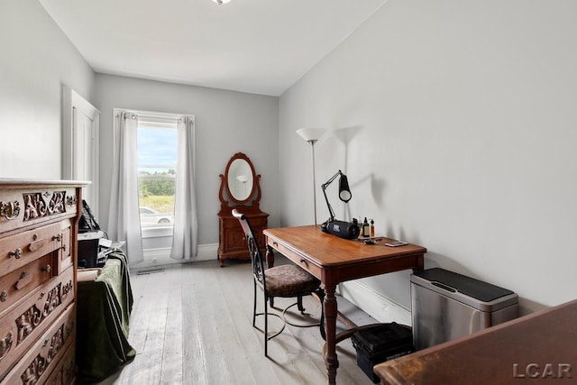 office area featuring light wood-type flooring