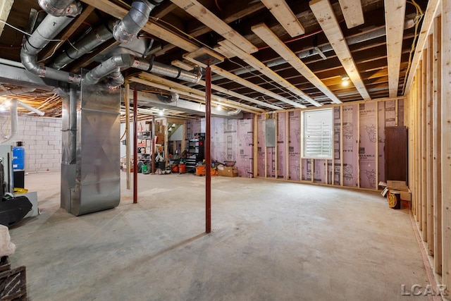 basement with electric panel and heating unit