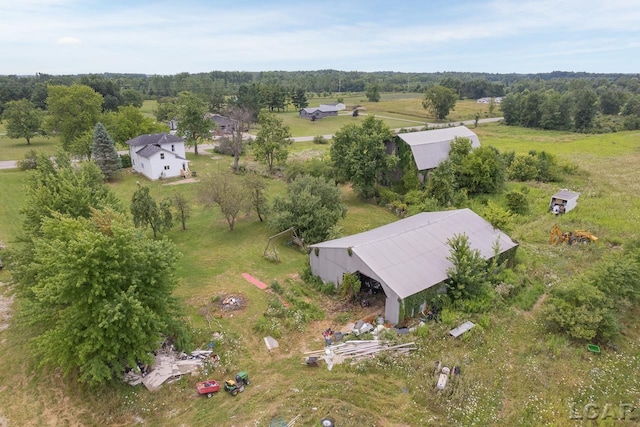 birds eye view of property featuring a rural view