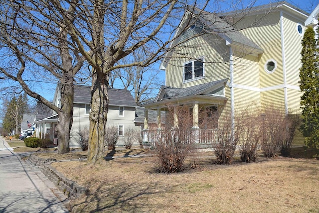 417 Barlow St, Traverse City, MI 49686 - view of home's exterior featuring a shingled roof