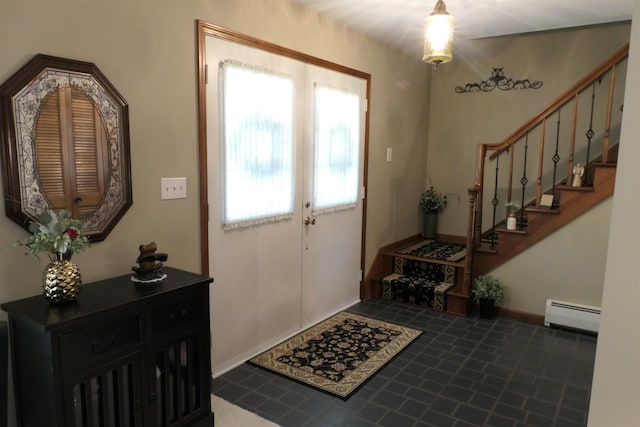 foyer entrance with french doors and a baseboard radiator