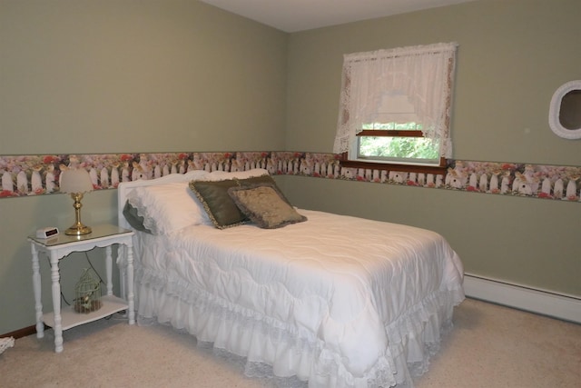 carpeted bedroom with baseboard heating