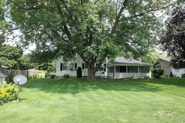 view of yard with a sunroom