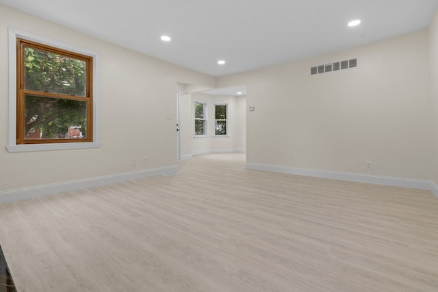 unfurnished room featuring light hardwood / wood-style flooring