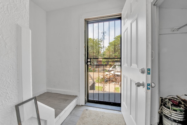 interior space with light tile patterned floors