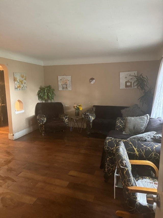 living room with dark wood-type flooring