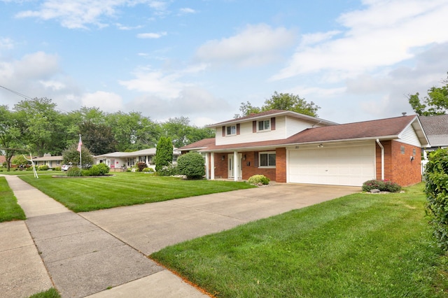 view of front of home featuring a front lawn, an attached garage, brick siding, and driveway