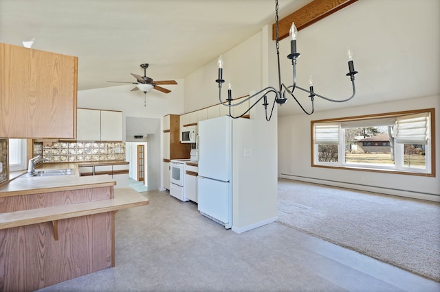 kitchen featuring high vaulted ceiling, a sink, backsplash, white appliances, and baseboard heating