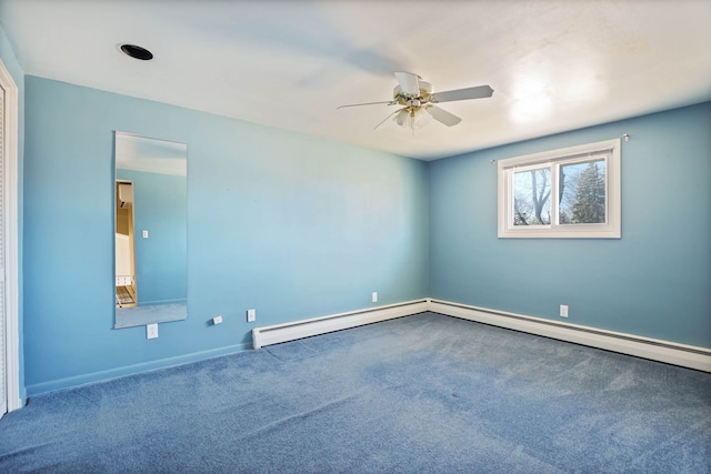 unfurnished room with a baseboard heating unit, carpet, baseboards, and a ceiling fan