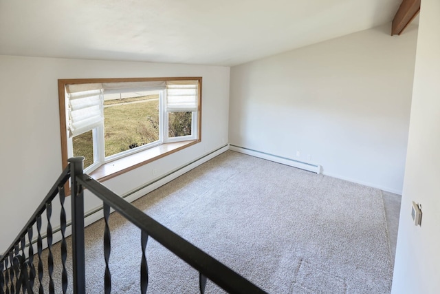 carpeted spare room featuring vaulted ceiling with beams