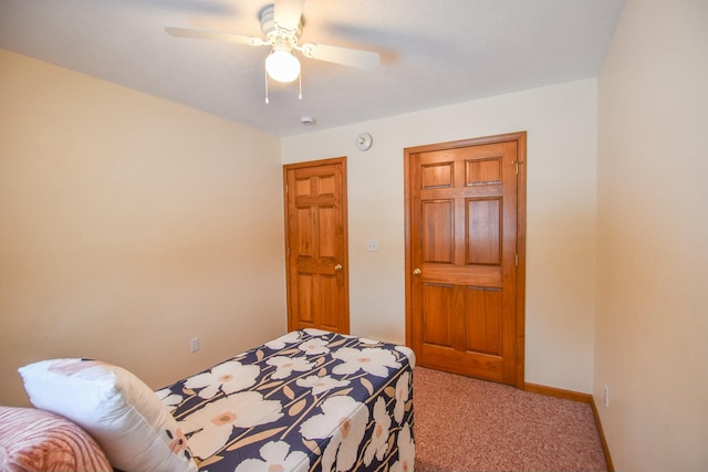 bedroom featuring carpet and ceiling fan