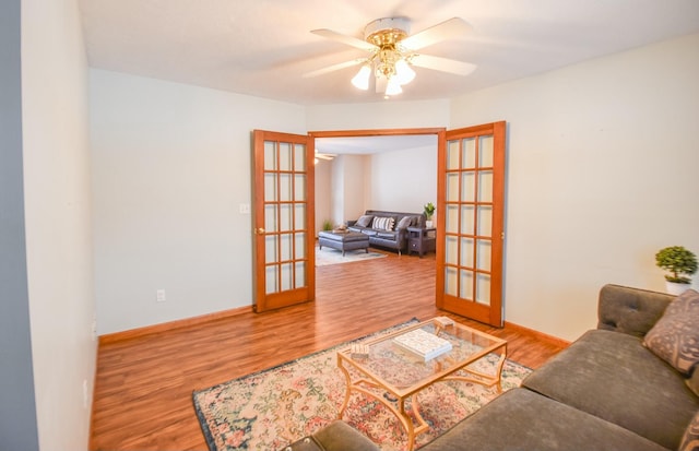 204 W Hatmaker Rd, Coldwater, MI 49036 - living area featuring french doors, wood finished floors, and ceiling fan