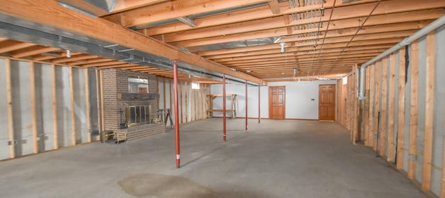 basement with a fireplace