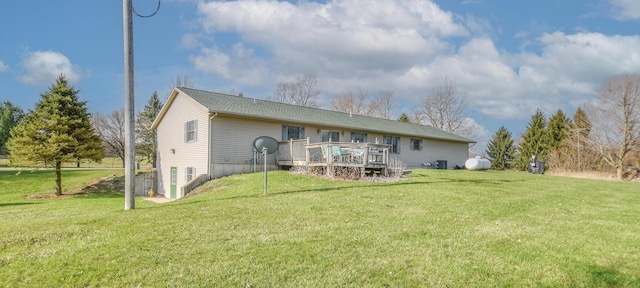 204 W Hatmaker Rd, Coldwater, MI 49036 - back of house with a deck and a lawn