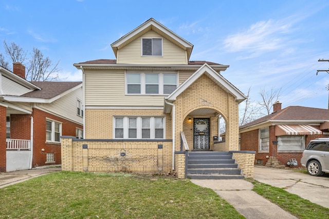 view of front of property with a front lawn