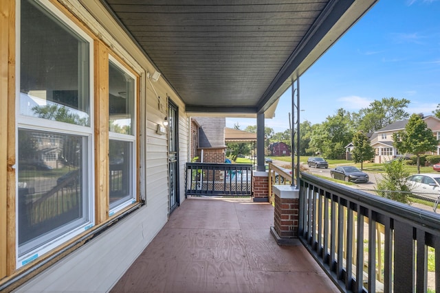 balcony featuring a porch