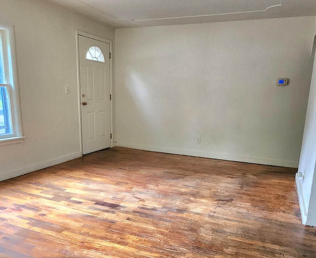 foyer entrance featuring hardwood / wood-style floors