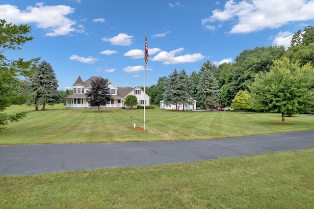 view of community with a lawn