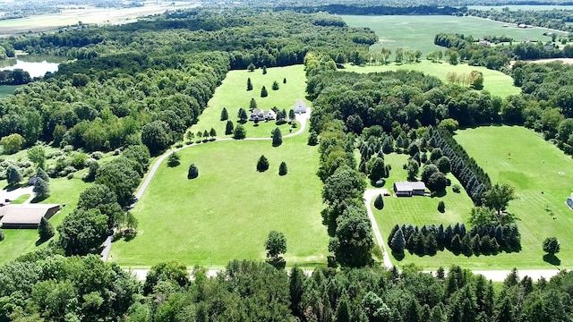 drone / aerial view featuring a rural view and a water view