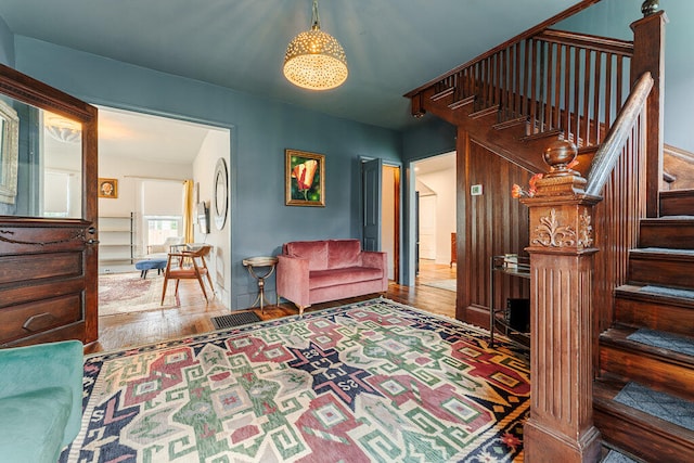 sitting room featuring hardwood / wood-style floors