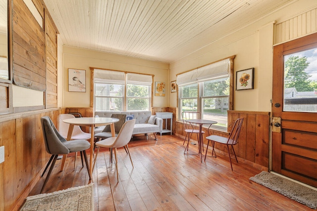 sunroom featuring wood ceiling