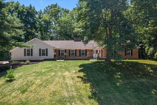 ranch-style home with a front yard