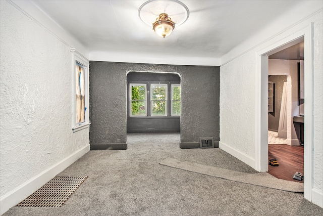 15766 Snowden St, Detroit, MI 48227 - unfurnished room featuring a textured wall, carpet, and baseboards