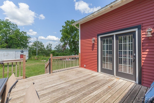 deck featuring a lawn