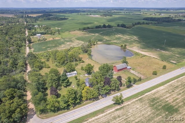 bird's eye view featuring a water view and a rural view