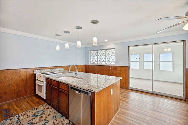 6800 Lakeshore Dr, Newport, MI 48166 - kitchen featuring stainless steel dishwasher, white electric stove, a sink, a wainscoted wall, and light wood-type flooring