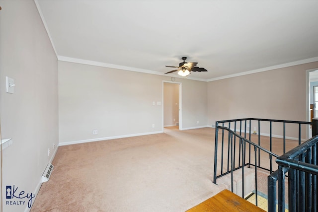 6800 Lakeshore Dr, Newport, MI 48166 - empty room featuring carpet flooring, baseboards, ceiling fan, and crown molding