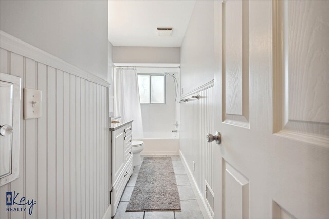 6800 Lakeshore Dr, Newport, MI 48166 - bathroom with tile patterned flooring, bathing tub / shower combination, and toilet