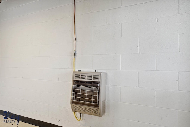 6800 Lakeshore Dr, Newport, MI 48166 - detailed view of heating unit and concrete block wall