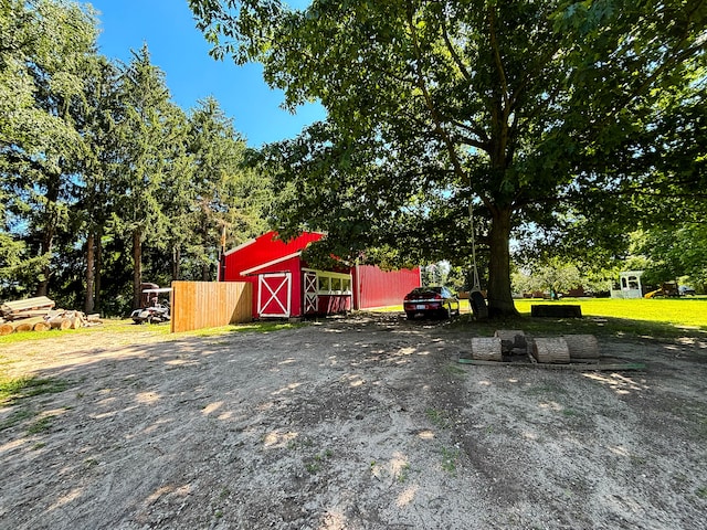 exterior space featuring an outbuilding