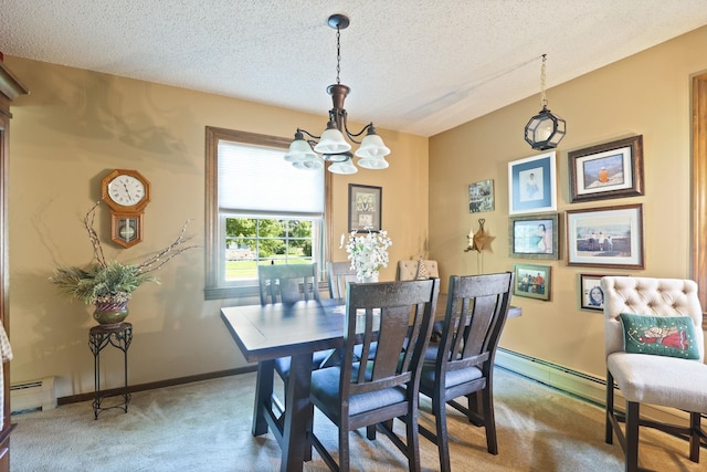 carpeted dining space with a baseboard radiator, a textured ceiling, and a notable chandelier