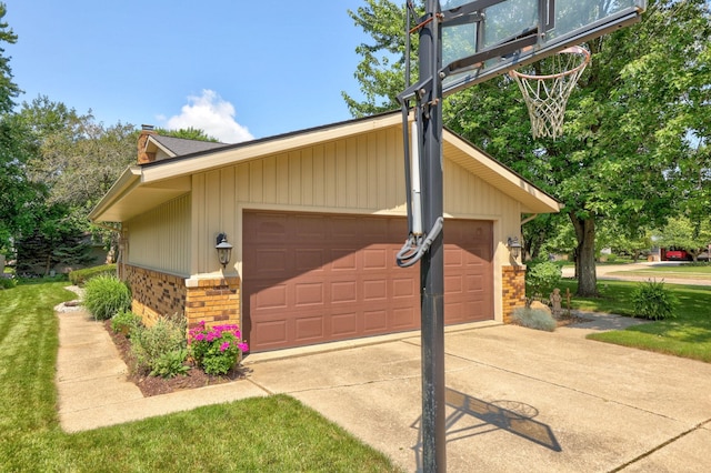 view of home's exterior featuring a garage and an outdoor structure