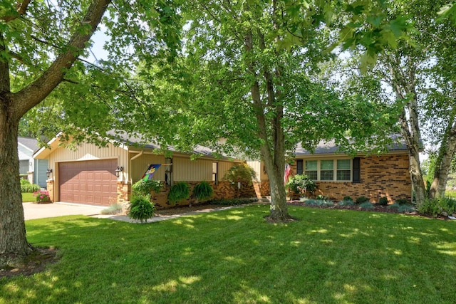 ranch-style home with a front yard and a garage