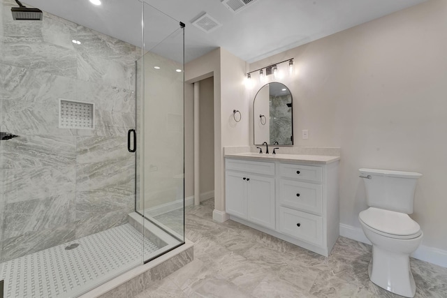 bathroom featuring walk in shower, vanity, and toilet