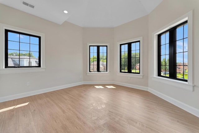 empty room with light wood-type flooring