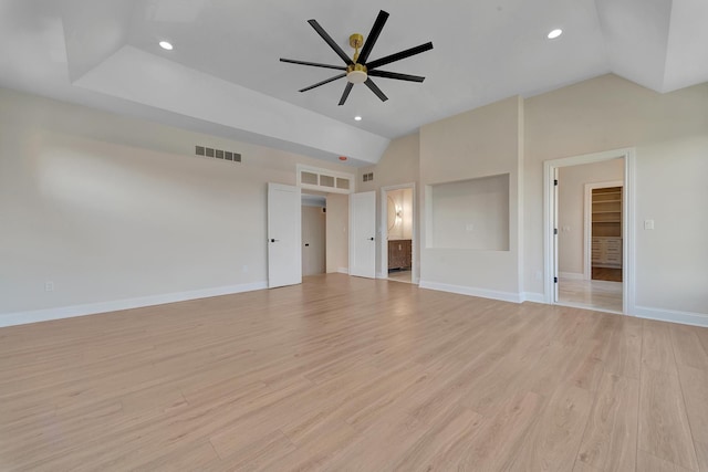 interior space with ceiling fan, high vaulted ceiling, and light wood-type flooring