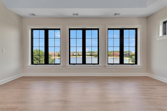 empty room with light wood-type flooring