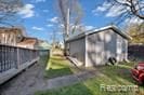 view of yard with an outbuilding