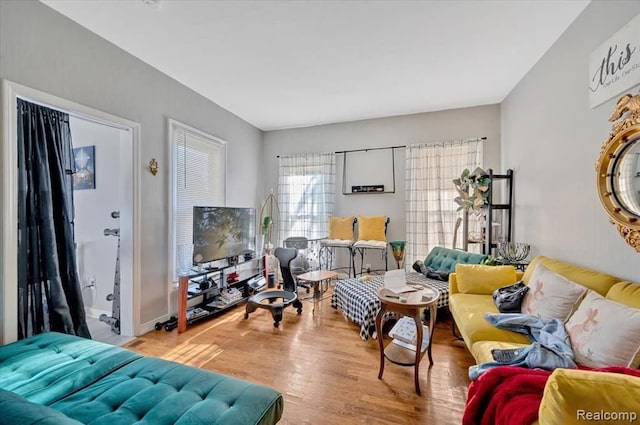 living room with light hardwood / wood-style floors