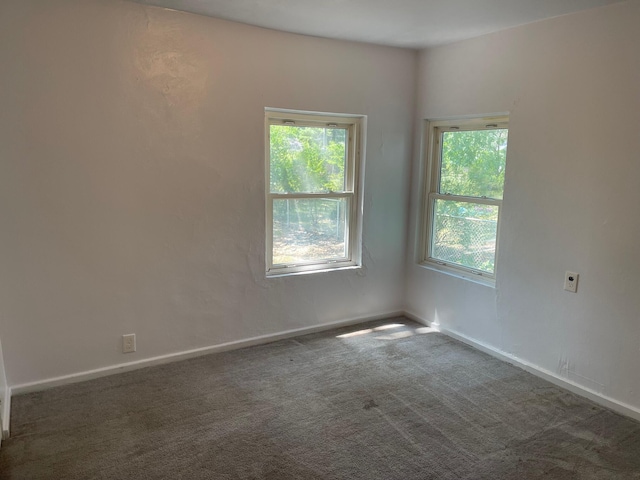 1981 Ray St, Muskegon, MI 49442 - carpeted spare room with baseboards