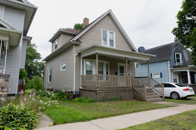 bungalow-style home with a porch